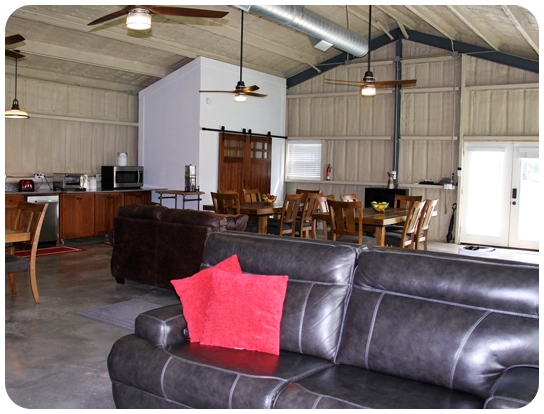 A living room with couches and chairs in it