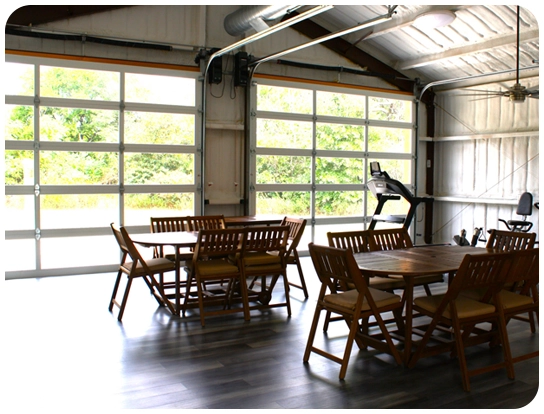 A room with tables and chairs in it