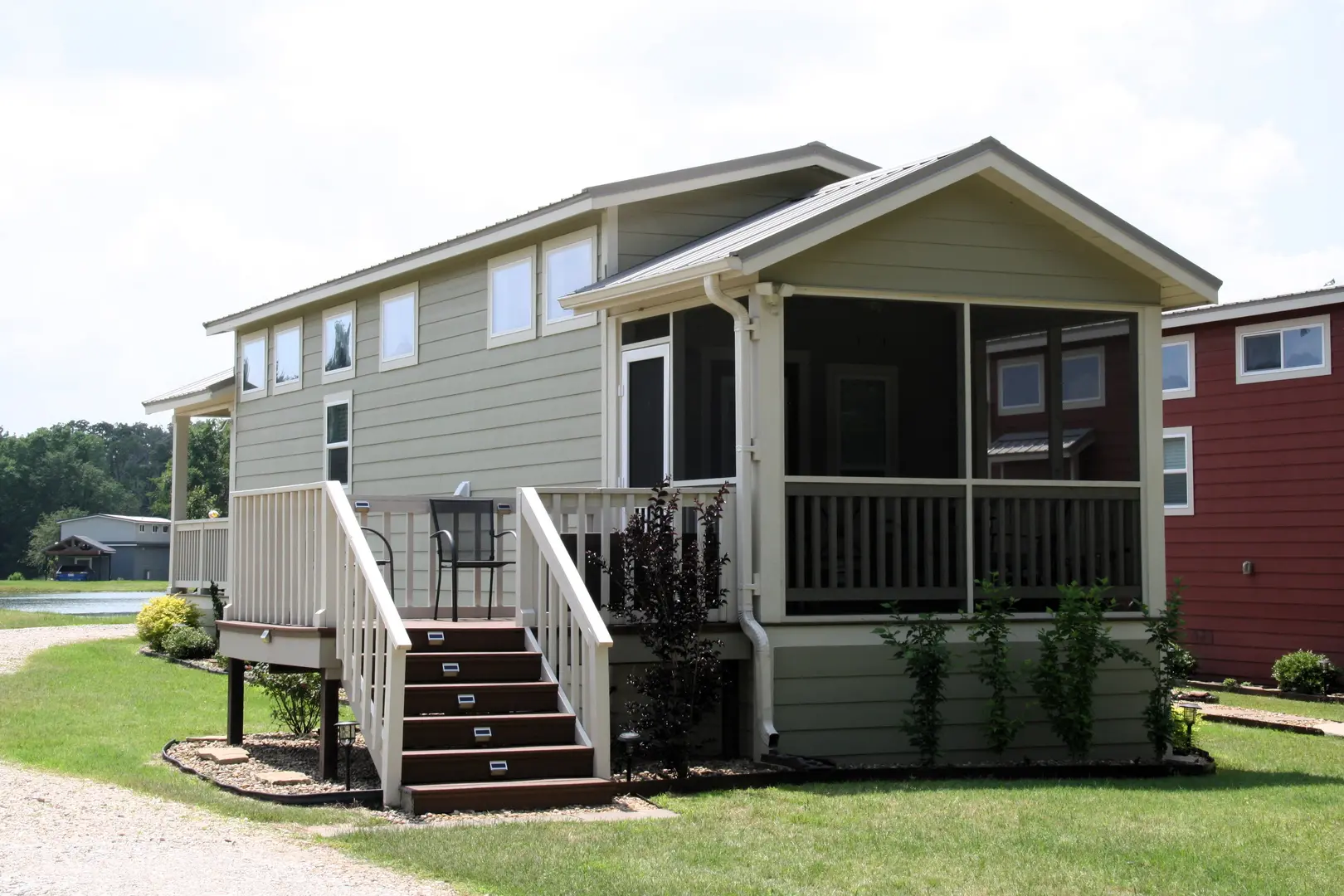 A house with stairs leading to the front porch.